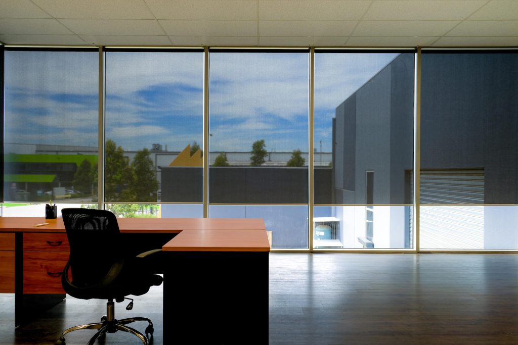 Office with automated blinds | Featured image for A Guide to Selecting Blinds for Offices Blog from U Blinds Australia.