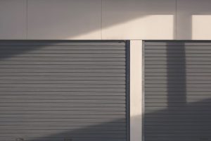 Shadows Rolling Over Two Securidy Doors | Featured image the How to Choose a Security Door Blog by U Blinds Australia.