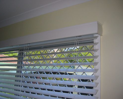 Blinds over a window | Featured Image for the Timber Venetian Blinds page of U Blinds Australia.