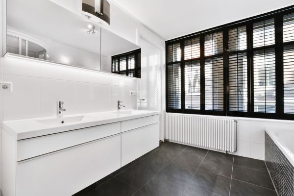 spacious-bathroom-with-white-furniture-2021-10-21-02-43-25-utc